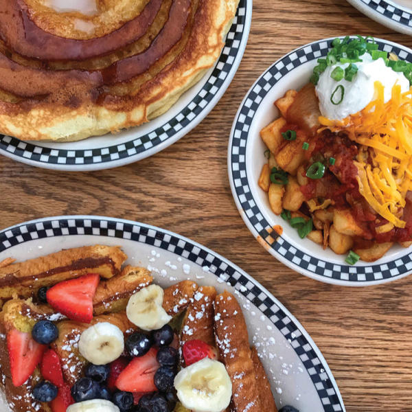 French toast, pancake and homefries breakfast plates from Village Deli