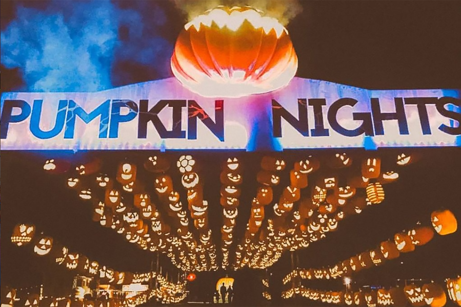 Pumpkin Nights entrance with floating glowing jack o lanterns