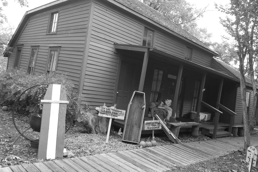 Black and white photo of exterior of the "Two Bit" Taylor Inn