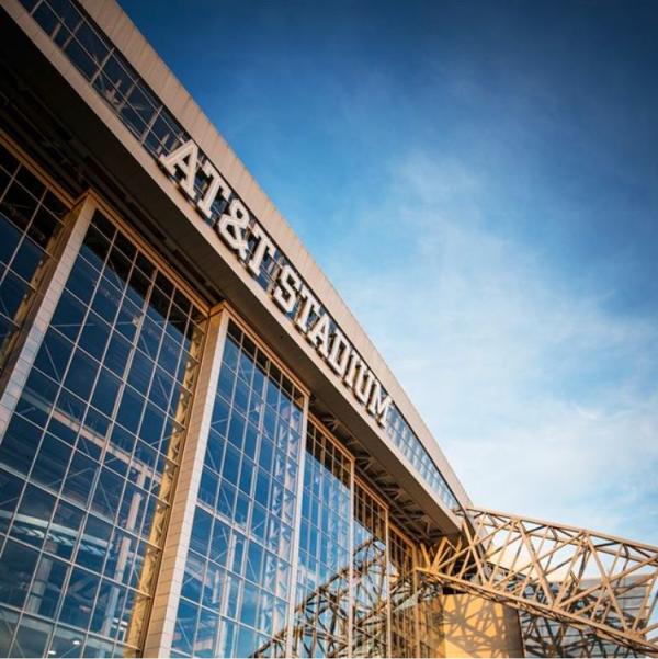 Exterior View of AT&T Stadium with Sky Reflection
