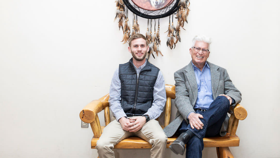 Owner George Cook with son Nicholas, who's learning the family business.
