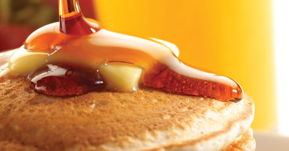 Wakarusa Maple Syrup drizzling on pancakes