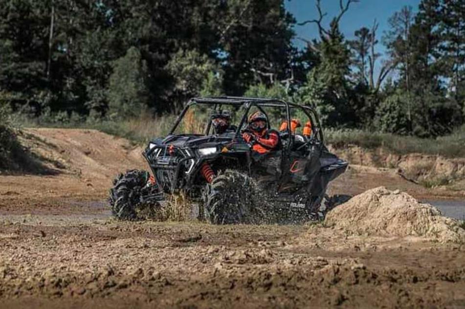Side Trax Rental - ATV Rider in the Mud