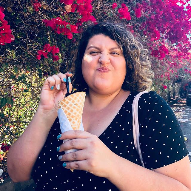 Melissa DiMercurio of Curves Ahead eating ice cream in a waffle cone