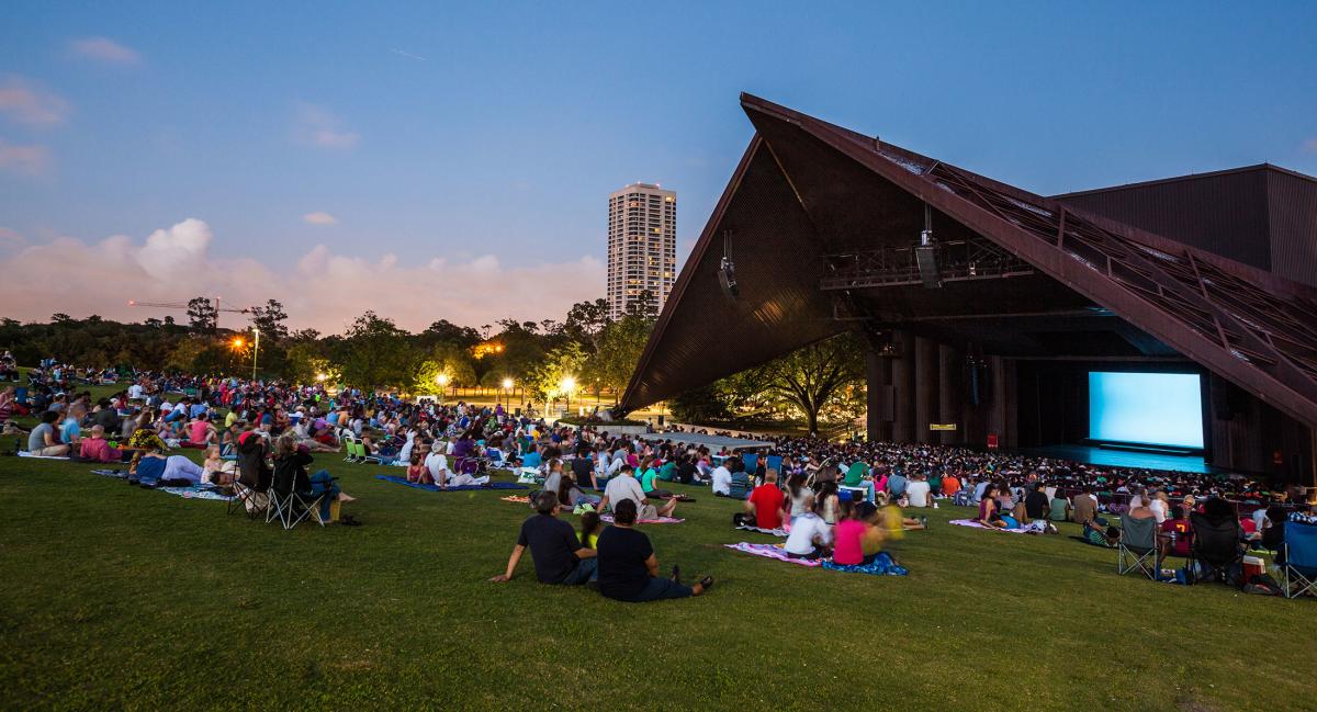 People watching a concert at Miller Outdoor Theatre in Houston