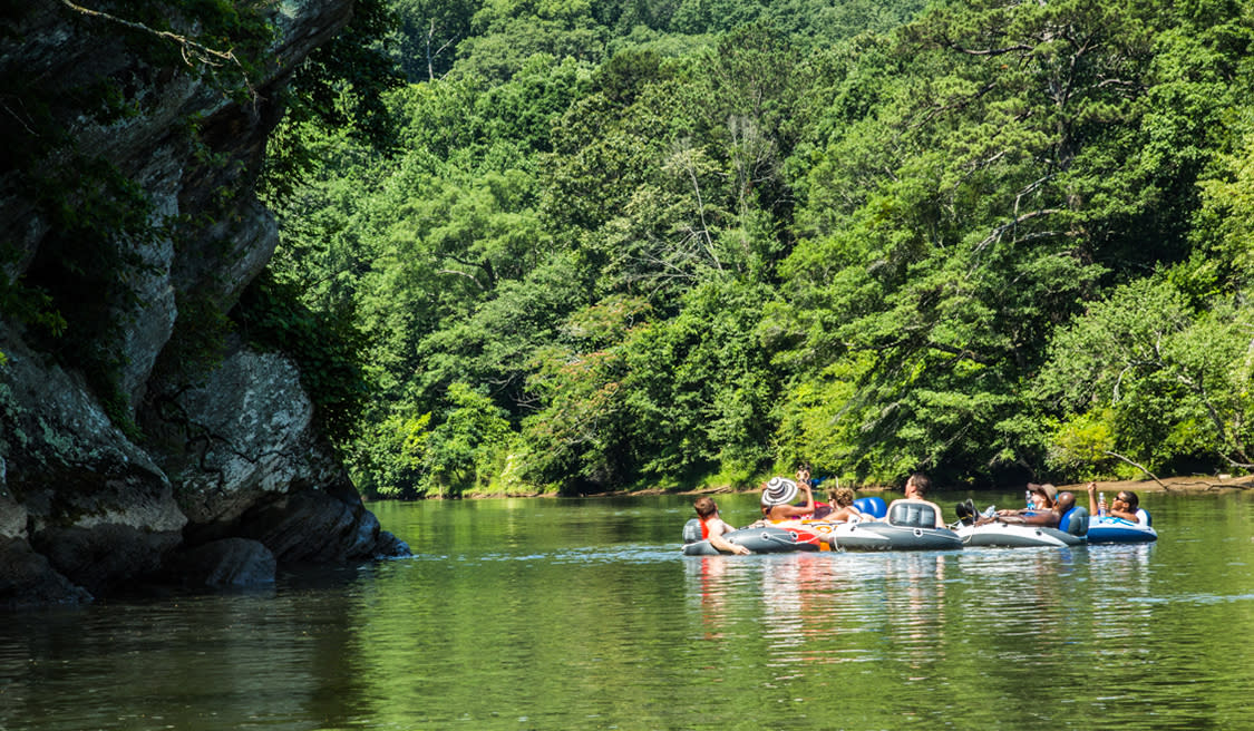 A group of people floating on the Chattahoochee River