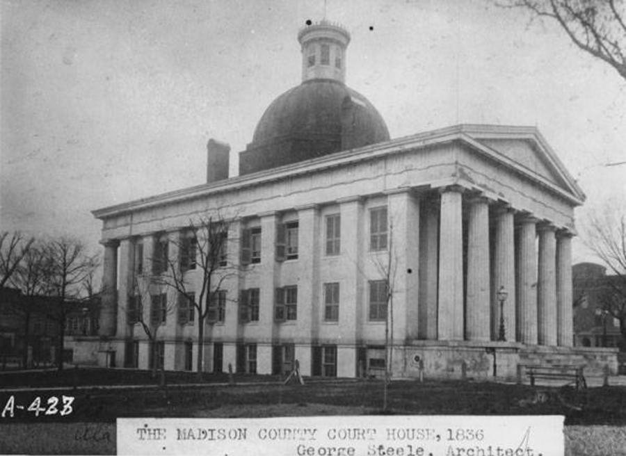 A black-and-white photograph of the Madison County Courthouse taken in 1836.