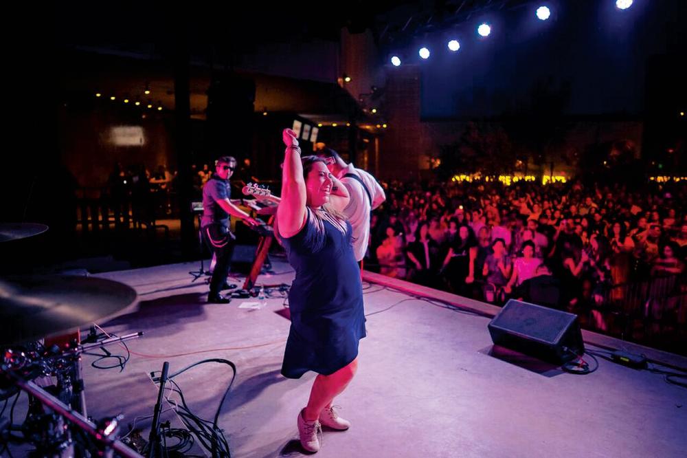 Stephanie Bergara with Bidi Bidi Banda selena cover band performing in austin texas