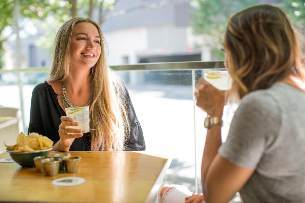 women drinking margaritas at la condesa in 2ND Street District in austin texas