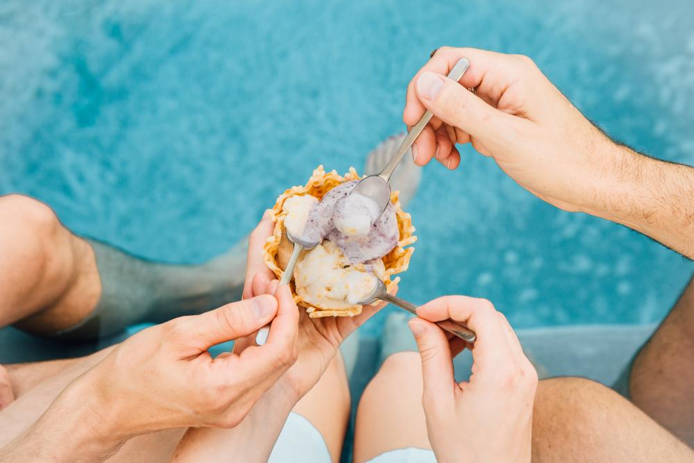 Scoops of Lick Honest Ice Creams by a pool in austin texas