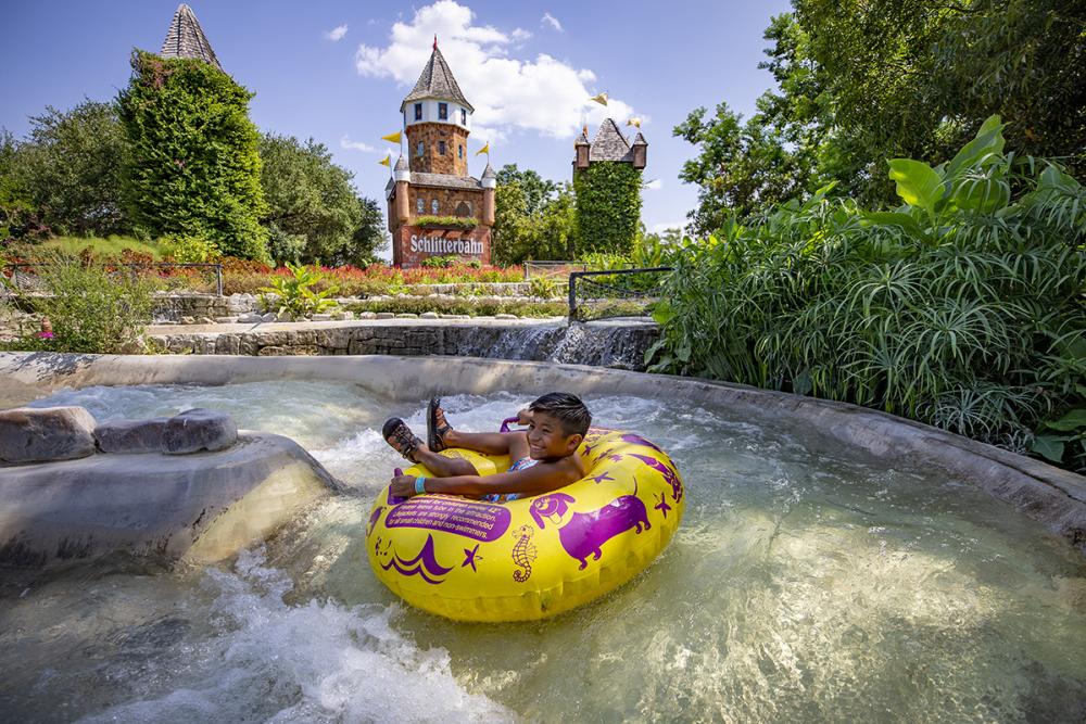 Child tubing at Schlitterbahn Waterparks and Resorts in New Braunfels Texas