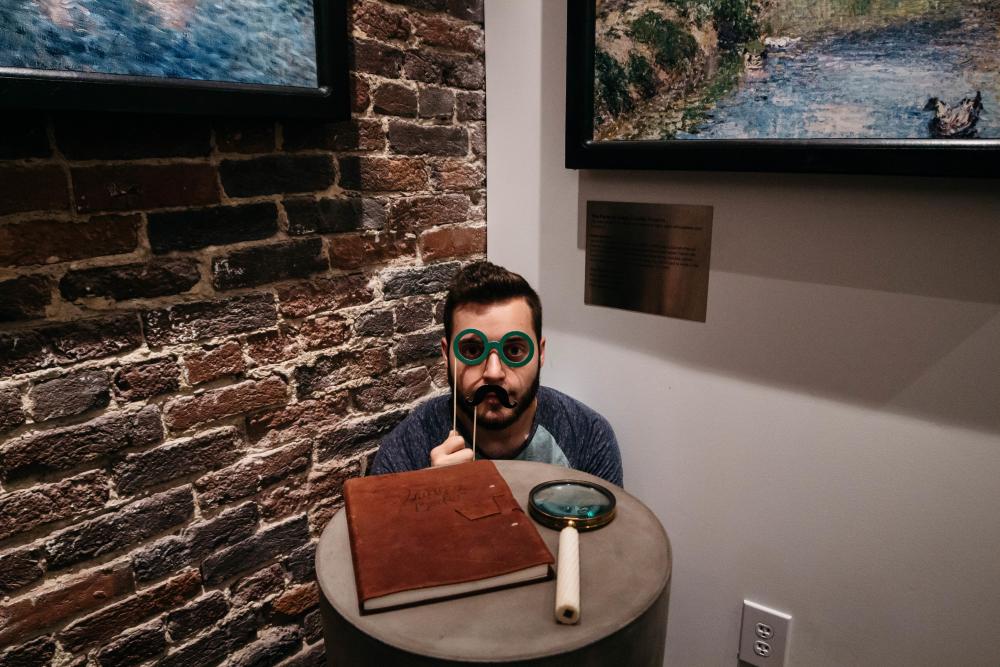 Man with clues at The Escape Game Austin Texas