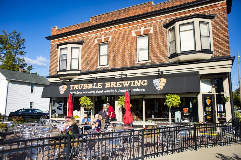 People dining on the outdoor patio at Trubble Brewing in Fort Wayne
