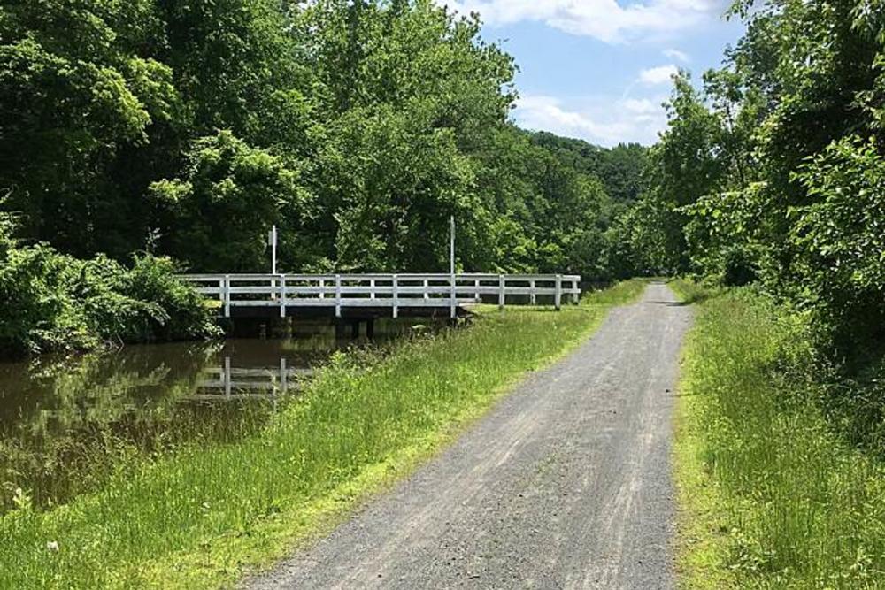 A bridge spanning the trail at Delaware & Raritan Canal Path near Princeton, NJ.