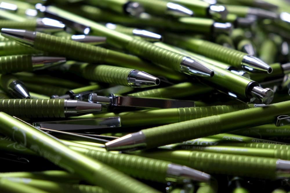 Stock photo of a pile of green pens