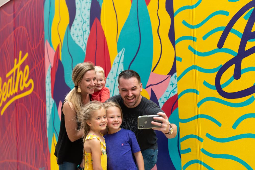 Family exploring the murals in Downtown Fort Wayne