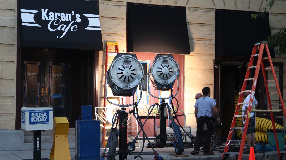Film crew outside set of Karen's Cafe
