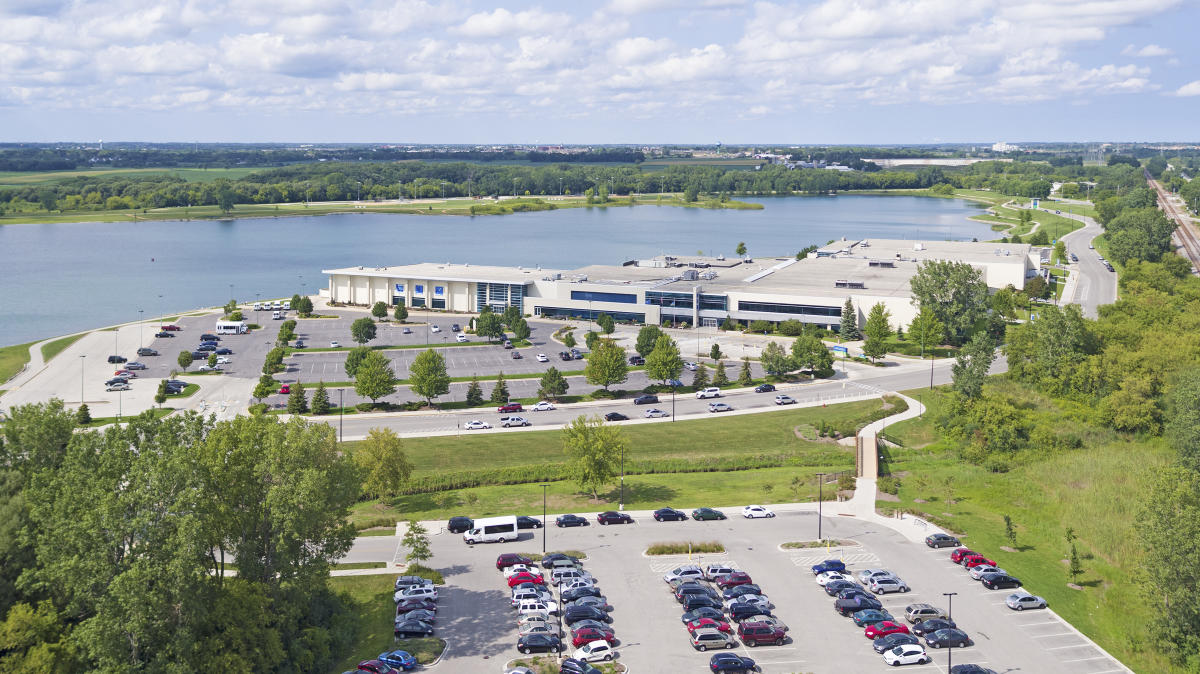 Drone picture of RecPlex from parking lot with Lake in Back