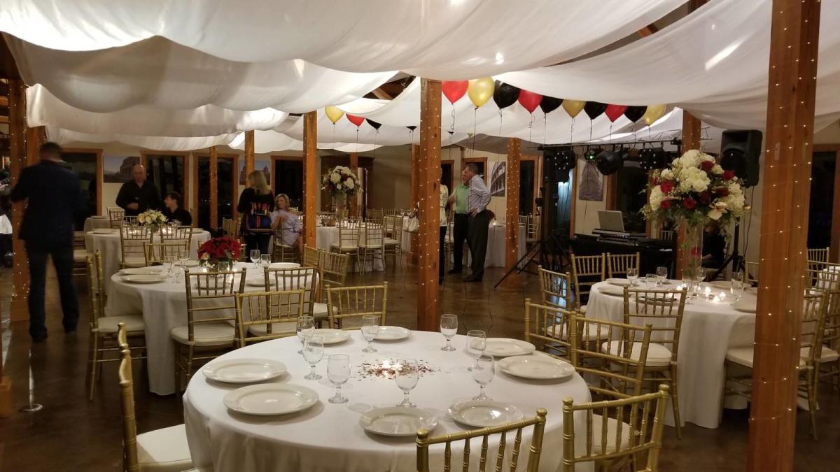 Tented Meeting Area With Round Tables