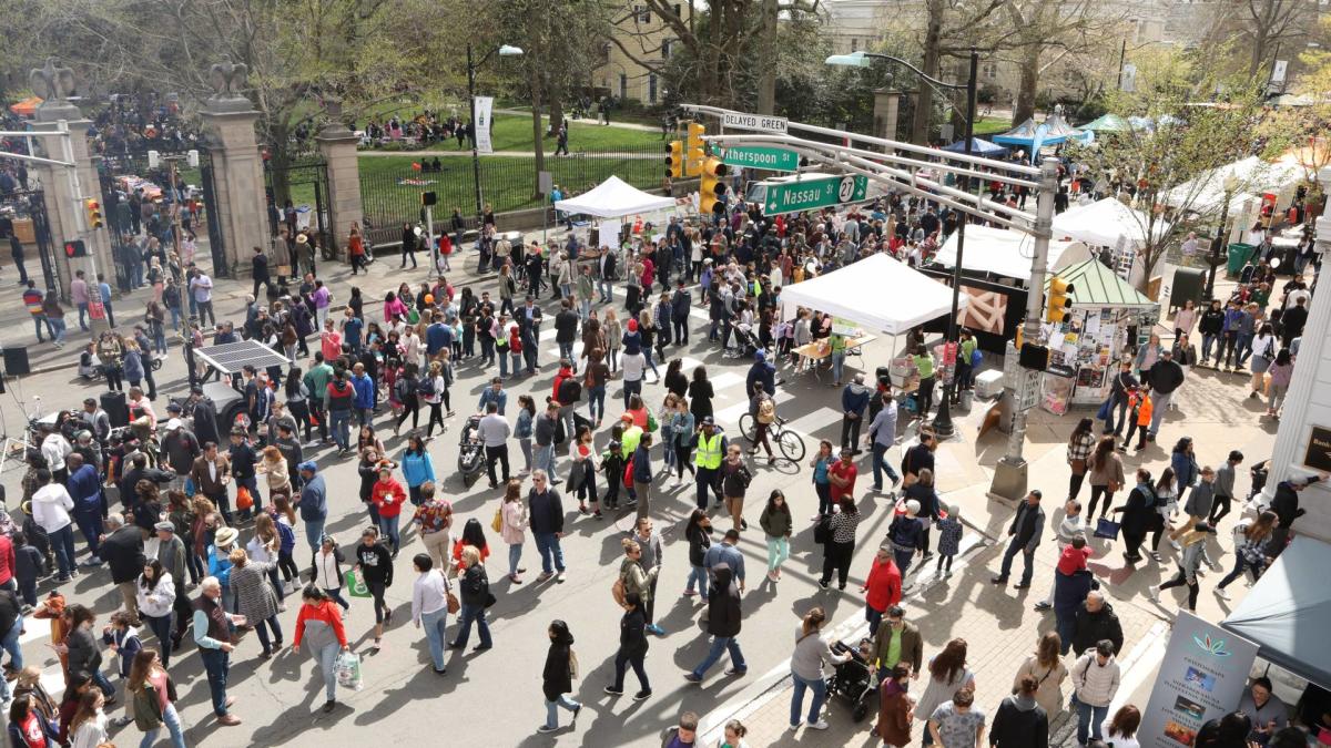 Crowds of people at Nassau and Witherspoon Streets enjoying Communiversity in Princeton