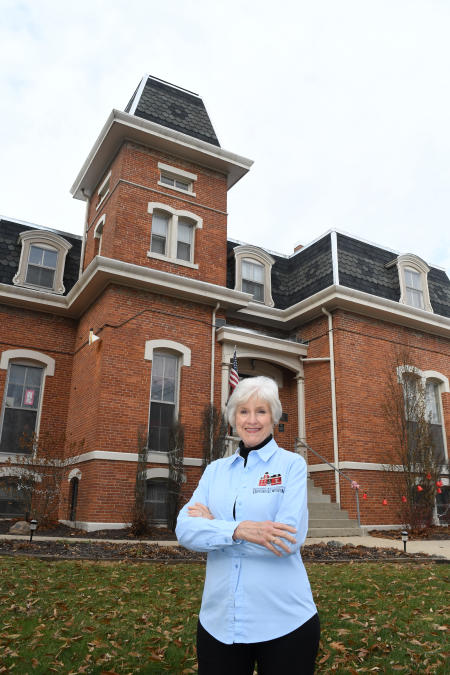 Deanna Hindsley in front of the Hendricks County Historical Museum