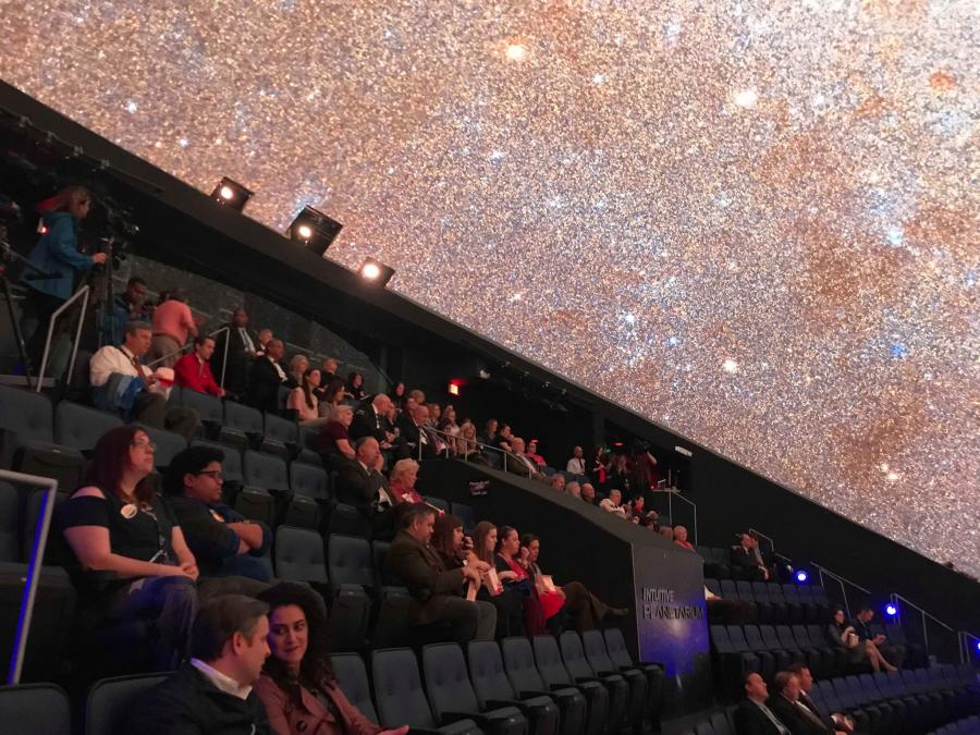 Visitors enjoy an engaging program at the Intuitive Planetarium in Huntsville.