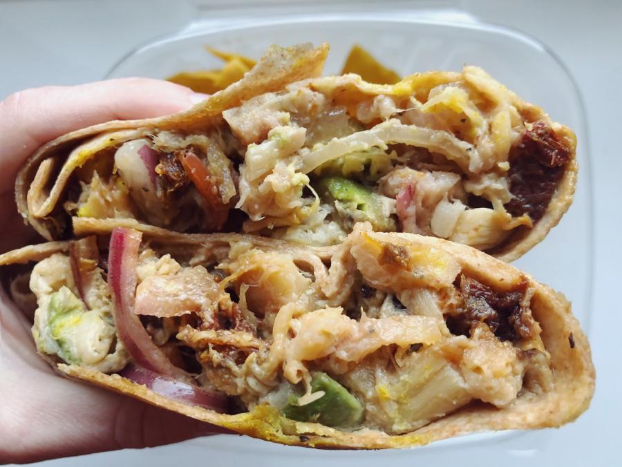 The Veggie is a meal prep service specializing in vegan favorites like this Buffalo Cauliflower Wrap.