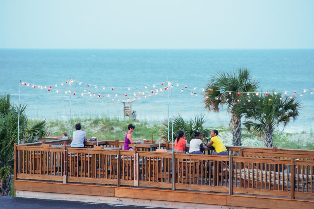 Outdoor dining at Hurricane Alleys