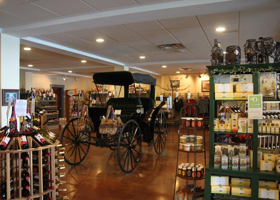 Photo of an old carrage inside the Belhurst Estate Winery