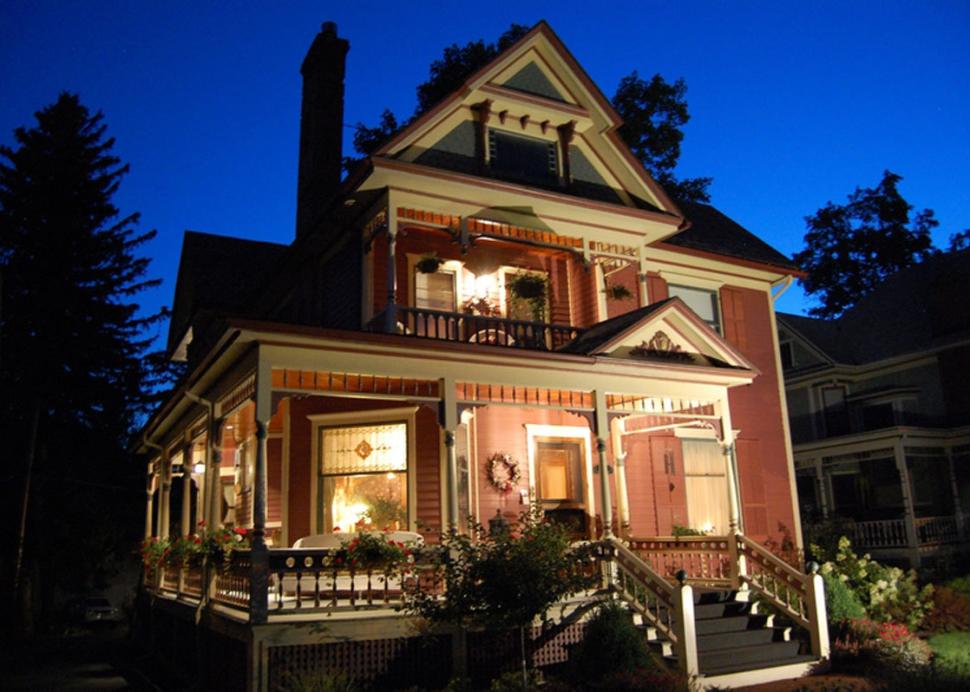 The nighttime lights highlight the gorgeous architecture at Bella Rose B&B