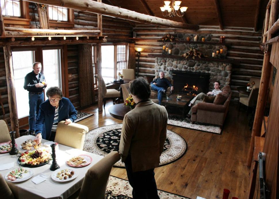 Dining and living area at Chalet B&B, complete with a fireplace