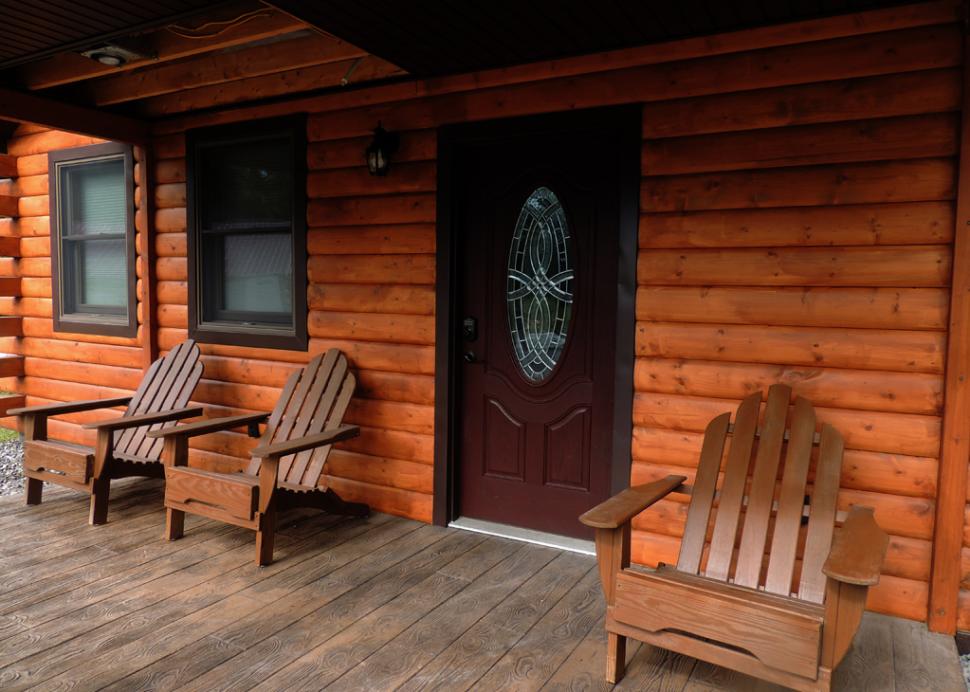 Relax and unwind on the covered porch.