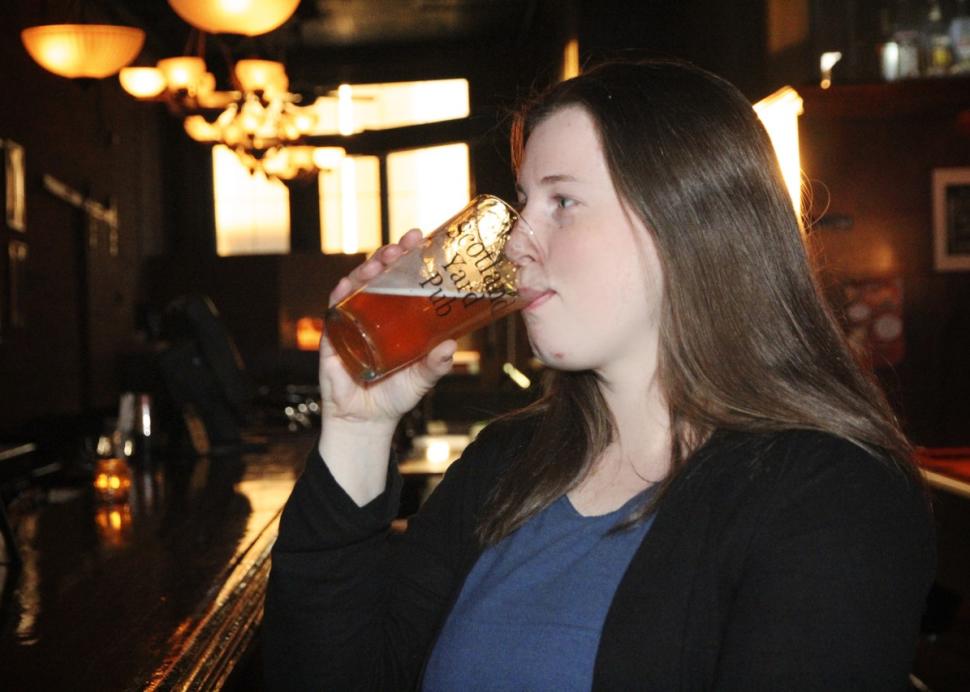 enjoying a glass of beer at Scotland Yard Pub