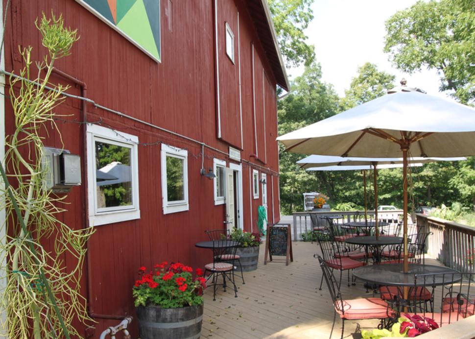 Photo of the tasting patio at Billsboro Winery during a sunny day