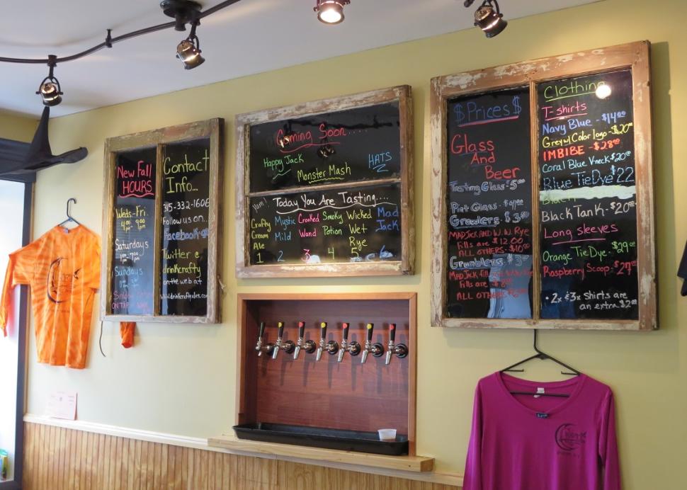 The chalkboards inside of Crafty Ales and Lager in Phelps