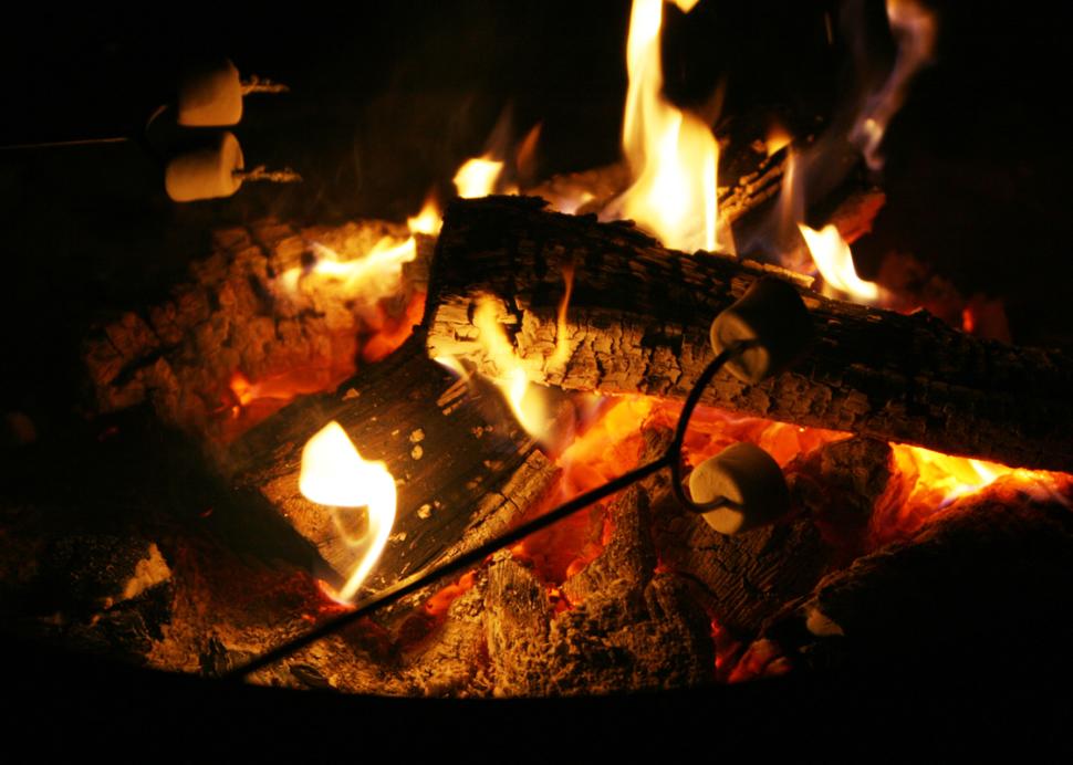 Photo of a campfire at nighttime burning at Creek-n-Wood in Bloomfield
