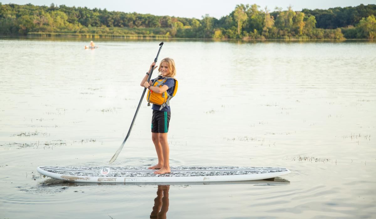 Stand-up paddleboarding on the lake