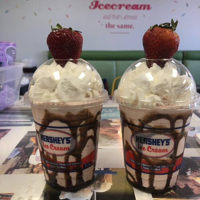 HoneyBee Creamery Ice cream desserts with strawberries on top