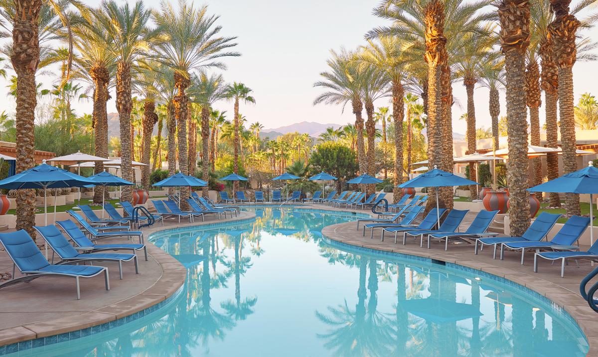 Pool surrounded by palm trees at Hyatt Regency Indian Wells