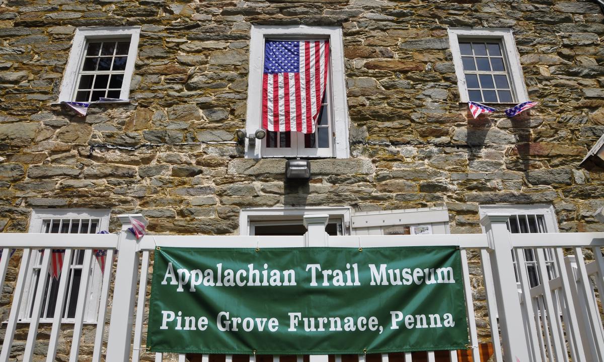 A banner welcomes visitors to the Appalachian Trail Museum in the Pine Grove Furnace State Park.