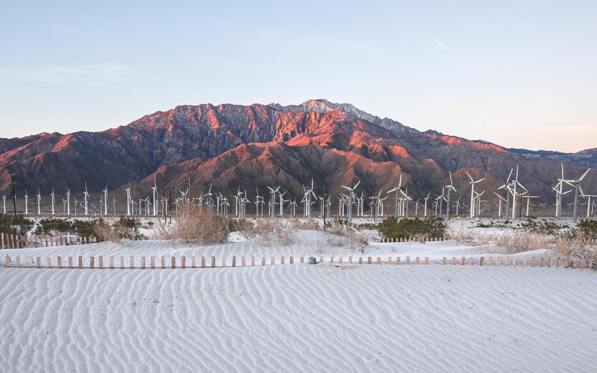 Mount San Jacinto at sunrise with windmills and sand dunes