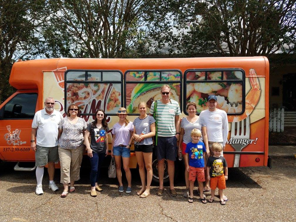 Foodies lined up by the Cajun Food Tour Bus