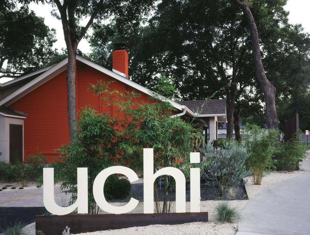 Exterior with sign reading Uchi in Austin Texas