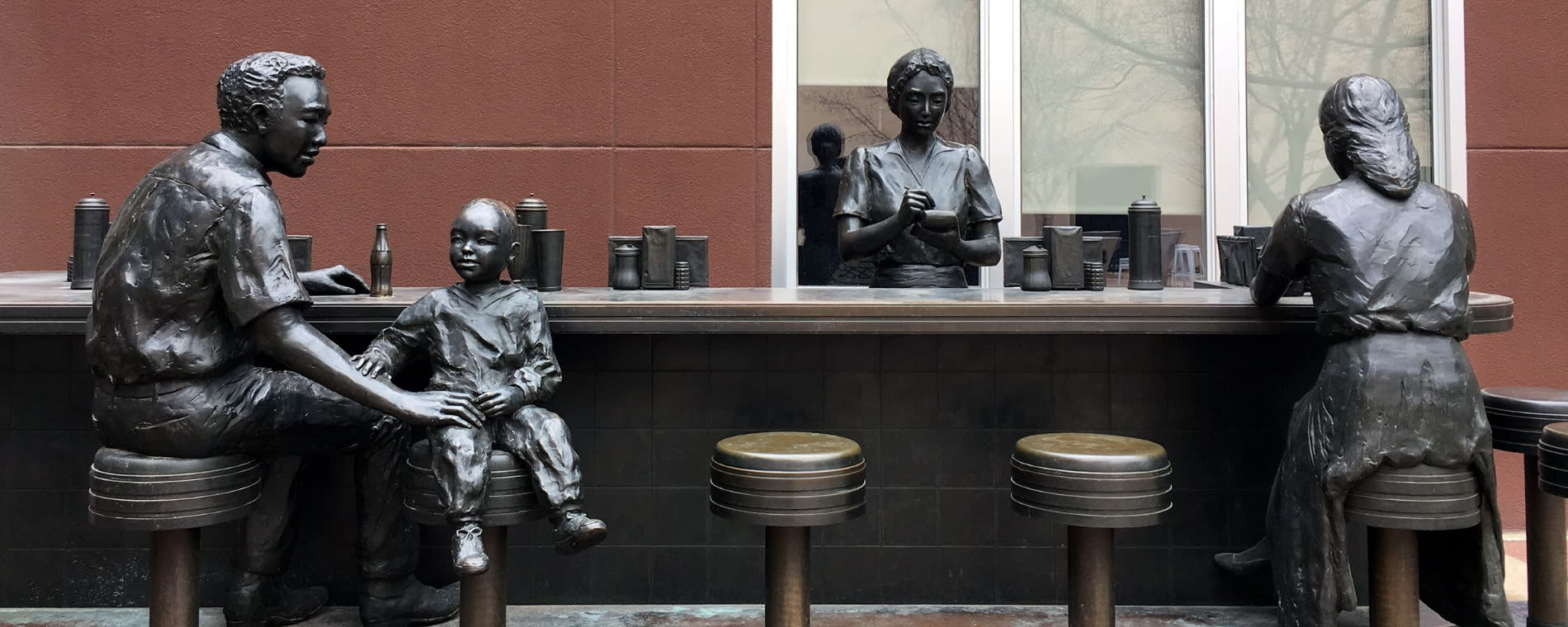 Dockum Sit-in Bronze Statue