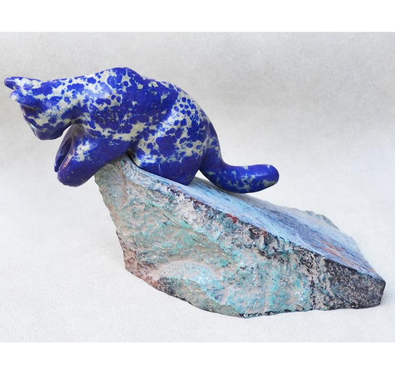 snow leopard fetish carving by Gibbs Othole, Zuni.