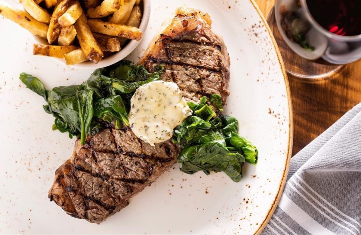 A plated steak and fries dish from The Public House at Sea Palms Resort on St. Simons Island, GA