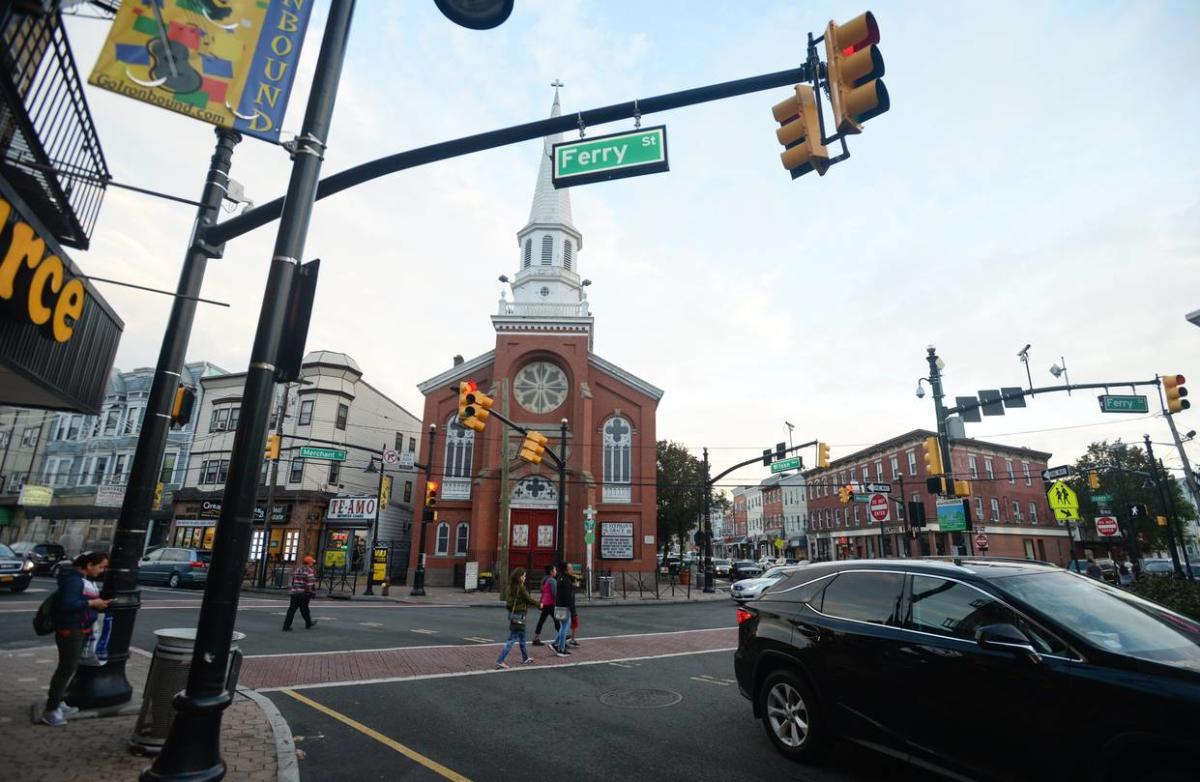 People Walking Around Ferry St. In Newark, NJ