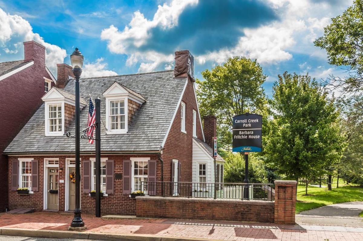 Exterior of Barbara Fritchie House with Carroll Creek Park sign