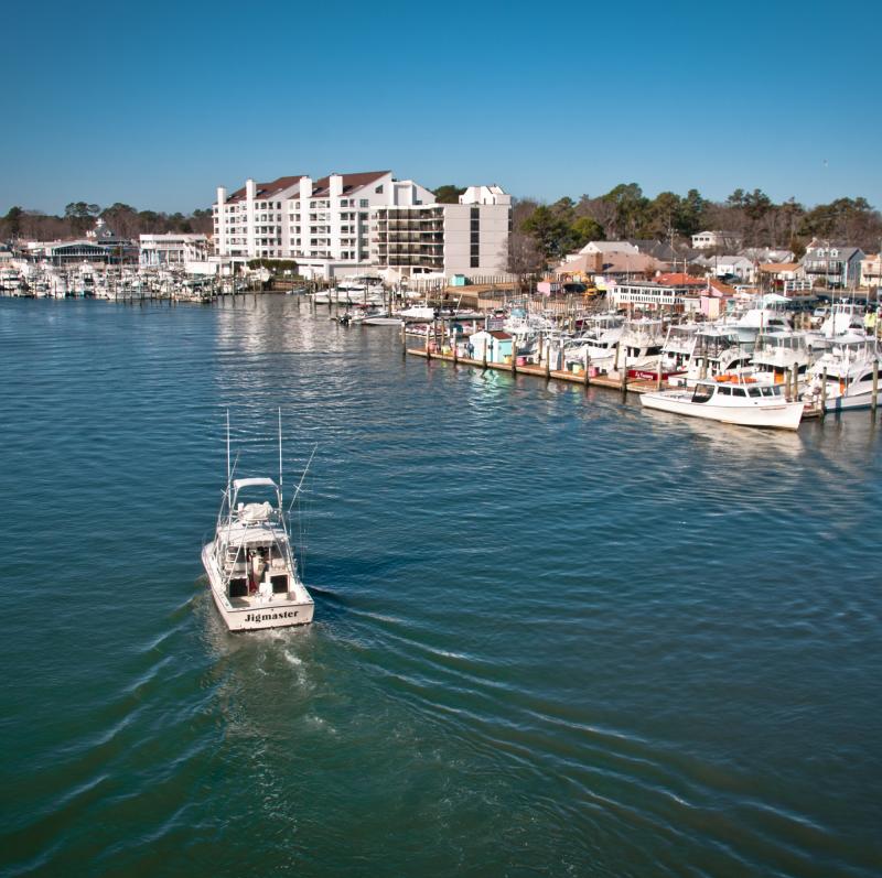 Boat approaching the shore of Rudee Inlet in Virginia Beach