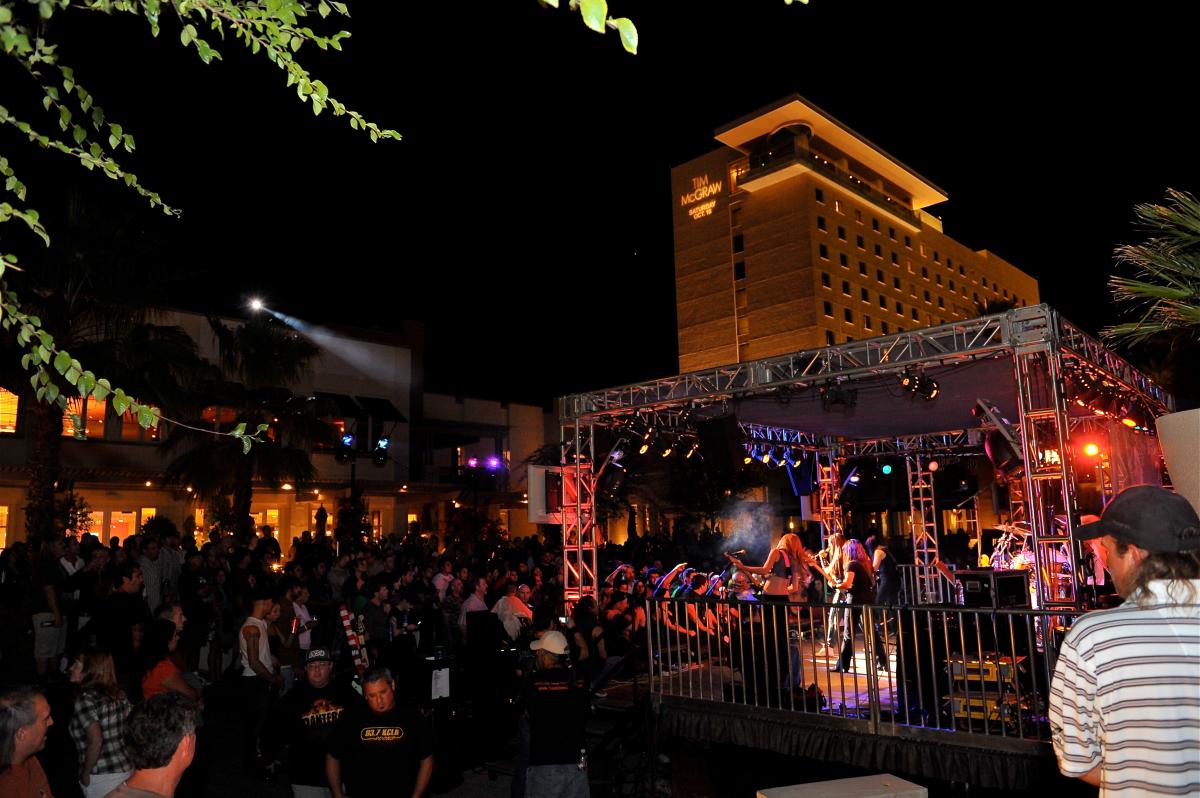 A crowd watches a cover band at The Rock Yard at Fantasy Springs Resort Casino